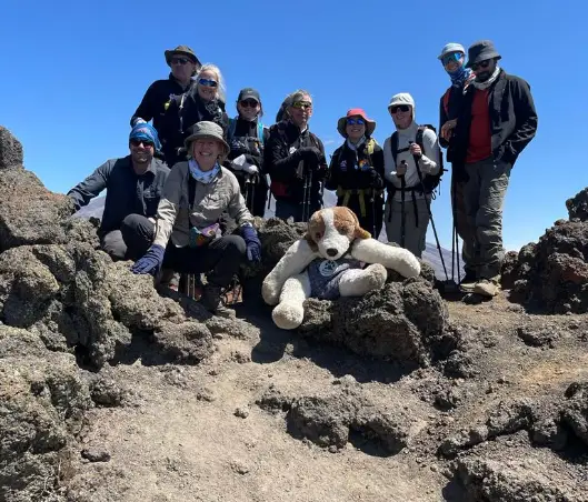 Group pic and tanzi on top of mountain Group pic and tanzi on top of mountain